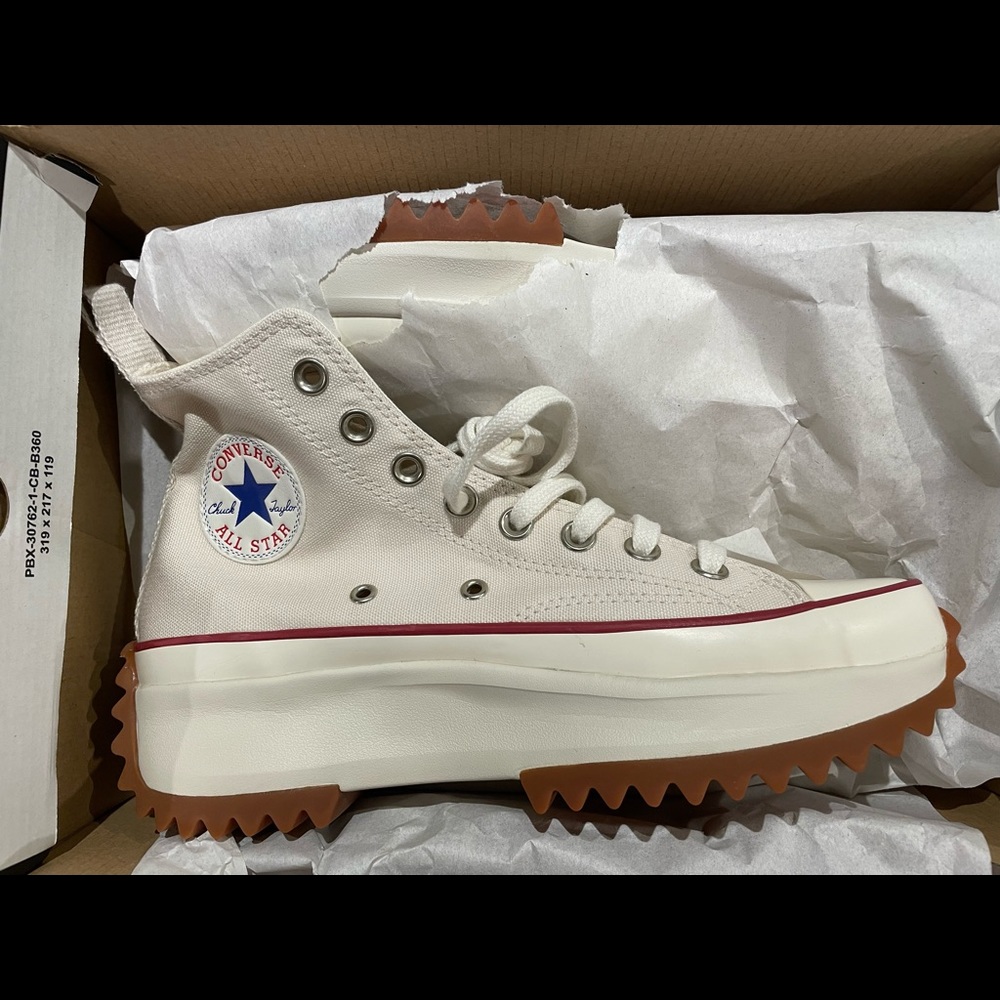 Cream color run star hike hi converse. Never worn not even once. New in box